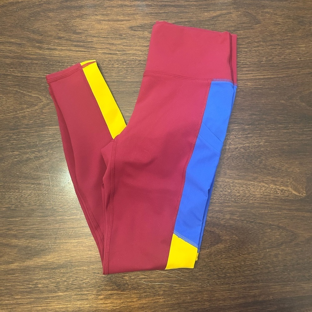 Fabletics Burgundy Leggings with Blue and Yellow Panels